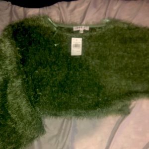 I’m selling a dark green kids shirt